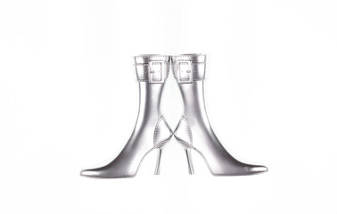 silver high heel boots isolated on white background