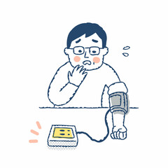 血圧測定の結果に焦る男性