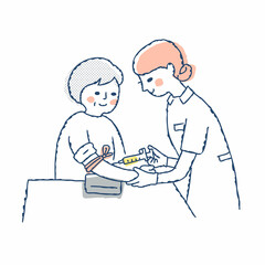 注射をしている看護師と患者
