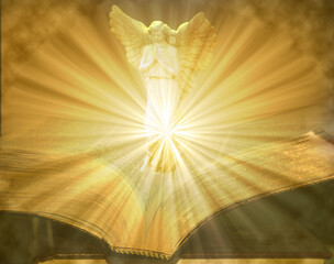 Angel on Open Lighted Bible