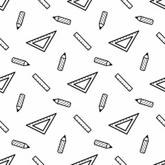 Seamless pattern of doodle black pencils, rulers for study on a white background. For advertising, packaging, design