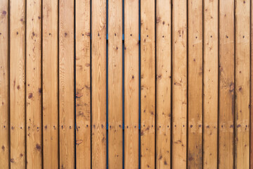 Wooden background with planks. The texture of brown wood from planks.