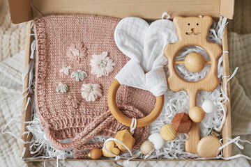 Hobbies and handicrafts. Knitted beanie with handmade embroidery. Wooden toys, rattles, teethers, nipple holder. Baby development, fine motor skills. Children and newborn products and accessories.