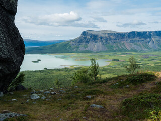 View on meandering glacial Rapadalen river delta valley at Sarek national park, Sweden Lapland with...