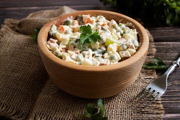 traditional olivier salad in a dish