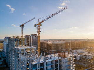 Cranes on the construction site - 467975273