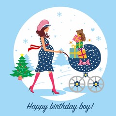 A pregnant girl with a stroller in a blue dress walks in the snow in the new year