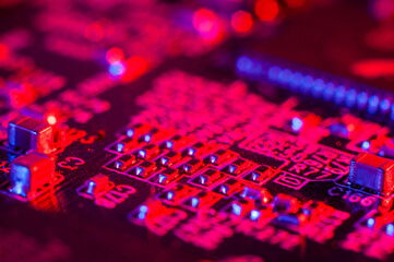Circuit board close up in bright red light