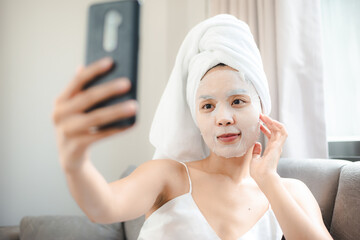 Asian woman with cosmetic face mask skincare to body healthy treatment spa