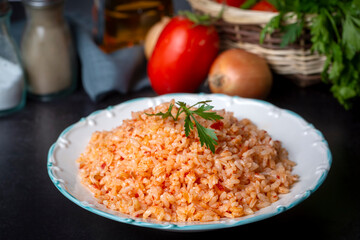 Traditional delicious Turkish food; rice pilaf with tomatoes (Turkish name; Domatesli pirinc pilavi)
