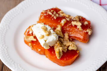 Traditional Turkish Pumpkin Dessert with Cream Butter (Turkish name; Kaymakli bal kabagi tatlisi or kabak tatlisi)