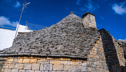 Historic Trulli houses in the city of Alberobello in Italy - a tourist attraction - travel...
