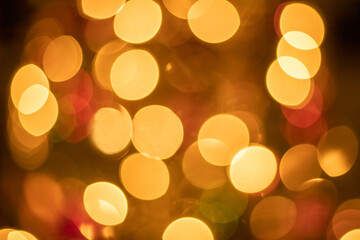 Christmas tree bright bokeh background , abstract golden holiday defocused lights