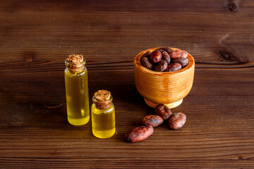Cacoa essential oil with cacoa beans. Cacoa butter cosmetic and healthcare products ingredient