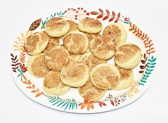 Snickerdoodle cookies on a paper plate