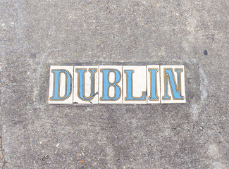 Dublin Street Tile Inlay on Sidewalk in Uptown Neighborhood in New Orleans, Louisiana, USA	