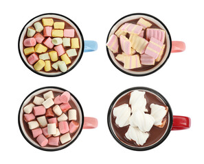 Set with cups of delicious hot chocolate on white background, top view