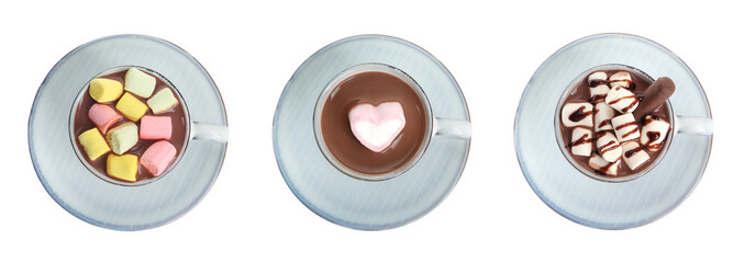 Set with cups of delicious hot chocolate on white background, top view. Banner design
