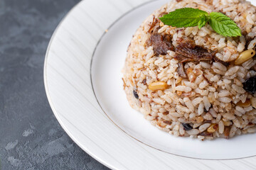 Traditional delicious Turkish food; rice pilaf with pine nuts and currants (Turkish name; ic pilav or pilaf)