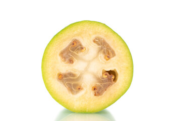 One half of organic sweet feijoa fruit, close-up, isolated on white.