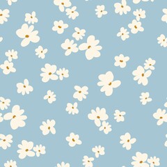 Seamless floral pattern. Fashionable background of wonderful white flowers . flowers scattered on a light blue background. Stock vector for printing on surfaces and web design.
