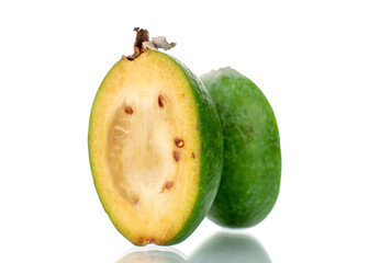Two halves of organic sweet feijoa fruit, close-up, isolated on white.