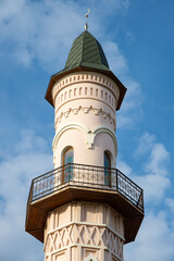 Fototapeta na wymiar Minaret of the Black Mosque (Kara Mosque) close-up. Astrakhan, Russia