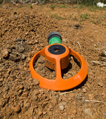 Sprayer for irrigation on the ground