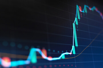 Close up financial chart with uptrend line graph in stock market on monitor background
