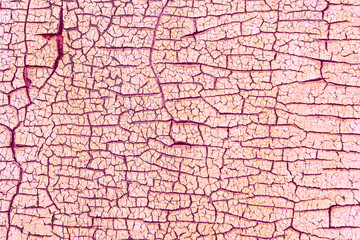 Wooden texture with scratches and cracks. It can be used as a background