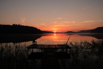 Jezioro na Mazurach. Sunset over the lake - obrazy, fototapety, plakaty
