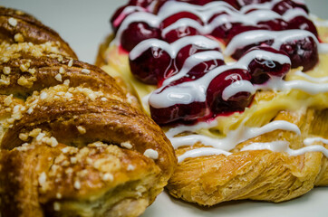 
Pastries, cherry puff and cherry puff and cream, photo on white