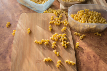 Different types of pasta Cellentani, Tortiglioni, Farfalle, spaghetti are often used in the kitchen for cooking.