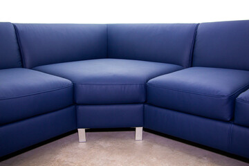 Corner folding sofa upholstered in leatherette, insulated on a white background,
