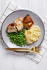Roasted pork and sauerkraut, top view, close-up