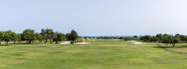 Beautiful panoramic view of a golf course in the Ria Formosa lagoon, Algarve 