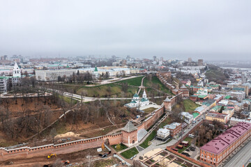 Fototapeta premium a panoramic view from a drone of the old part of the city with the Kremlin of Nizhny Novgorod on a cloudy autumn day 