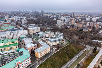 Fototapeta na wymiar a panoramic view from a drone of the old part of the city with the Kremlin of Nizhny Novgorod on a cloudy autumn day 