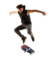 Skateboarder doing a jumping trick isolated