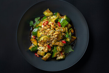 asian salad with asparagus on a black background