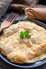 Spanish omelette tapa with potatoes and onion,