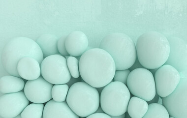 Dynamic abstract pastel colored 3d rendering background with soft spheres.
