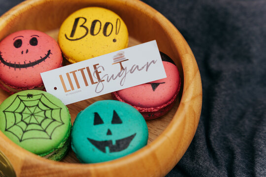 macarons painted in a halloween theme