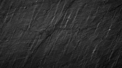 Abstract gray stone texture. Layered and cracked wall.