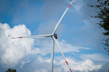 Beautiful cloudy sky with windmill in saarland germany europe