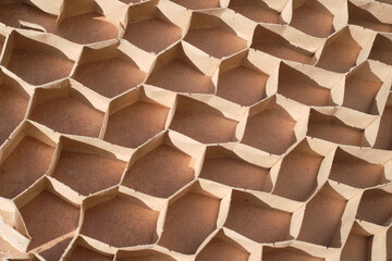 Inside view of a fragile interior cheap door made of fiberboard and chipboard, cells made of fragile cardboard