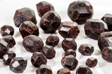 macro mineral stone  Garnet, on a white background