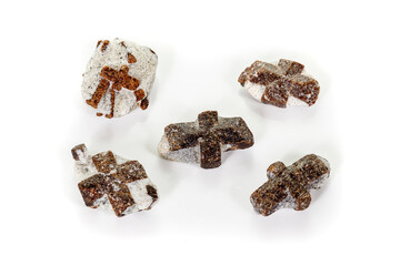 macro mineral stone Staurolite on a white background