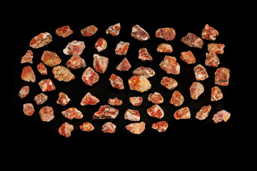 Macro mineral stone Vanadinite on a black background