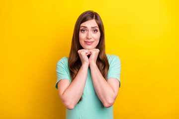 Photo of ask brunette hairdo young lady wear teal t-shirt isolated on yellow color background
